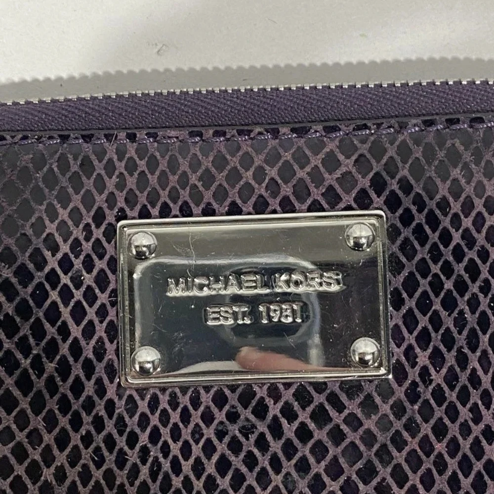 Michael Kors Purple Textured Clutch Wristlet.